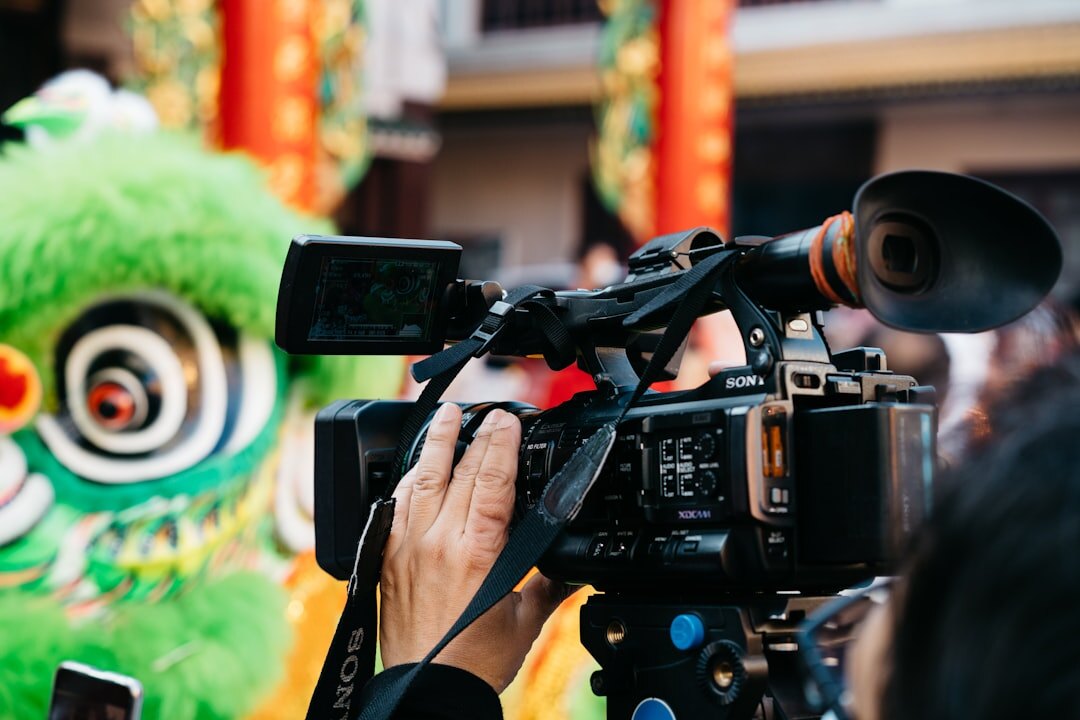 Camera crew filming a cultural festival