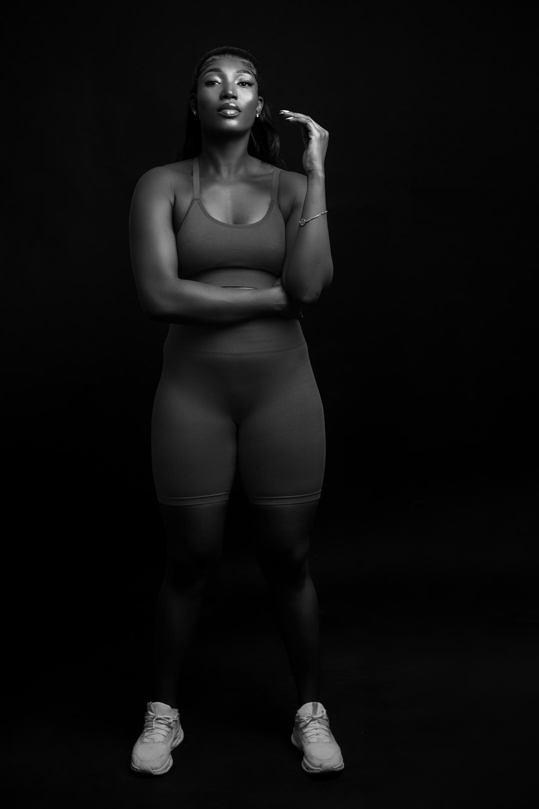 Studio portrait of a woman camera trainer
